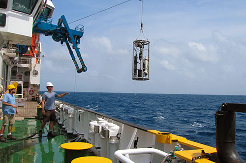 Optics rig being launched off the side of the ship